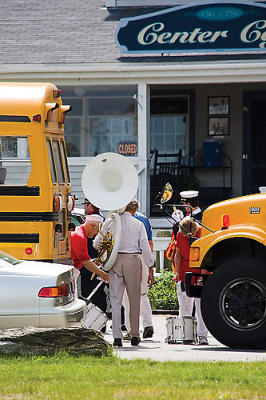 Then the buses arrive with the bands that get ready by...