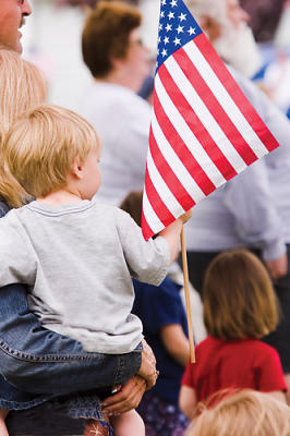 A young family watches.