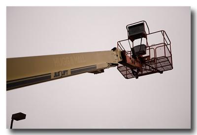 ....a cherrypicker...that IS what it's called, isn't it?
