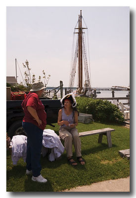 Heritage's 'Captain Cook' (she does the cooking) talks with a passenger after debarking.