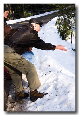 Poppa gives snowball throwing lessons....