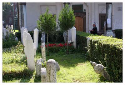 Praying in graveyard