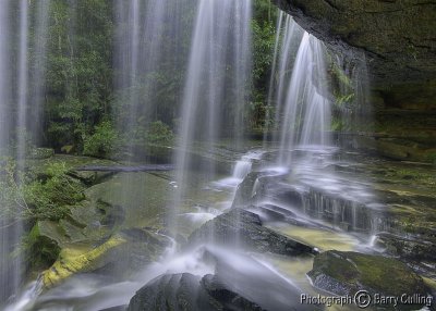 behind the waterfall.jpg