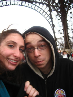 shivering while standing in line to climb the Eiffel Tower stairs