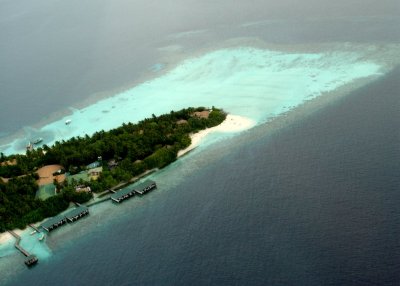 Maldives from above: turquoise pearls floating on the deep blue ocean