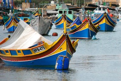 ...with a harbour packed with luzzu, the traditional fishing boats.