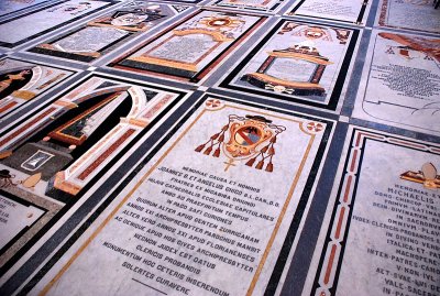 Tombstones, not tiles. Maltese nobles and clergymen rest underneath.