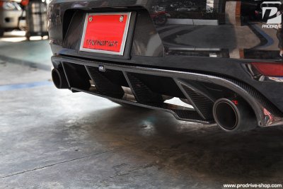 RevoZport Rear Carbon Diffuser + Akrapovic Exhaust on Golf VI GTi