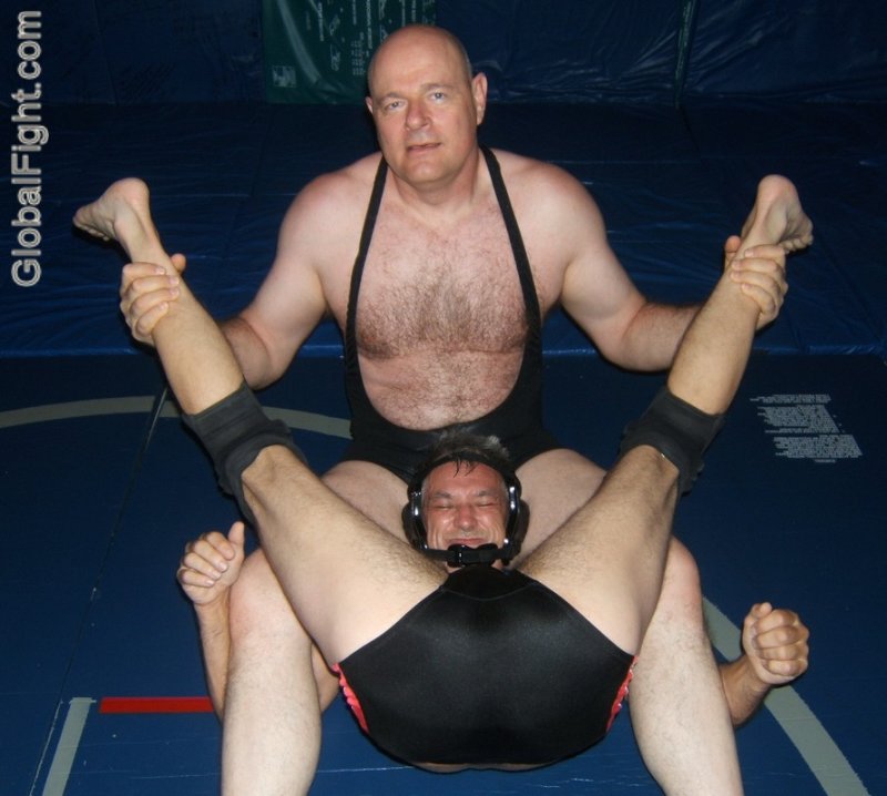 wrestling men holds headlocks grapevines camels sleepers scissors claws bearhugs crab suplex