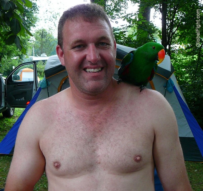 man with parrot bird on shoulder gay campground.jpg