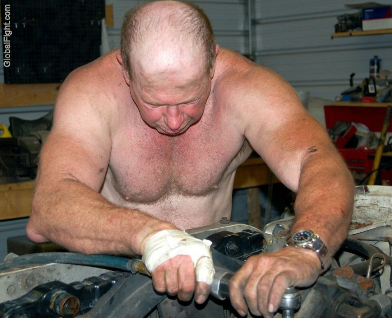 man working dirty shirtless on car mechanic men.jpg