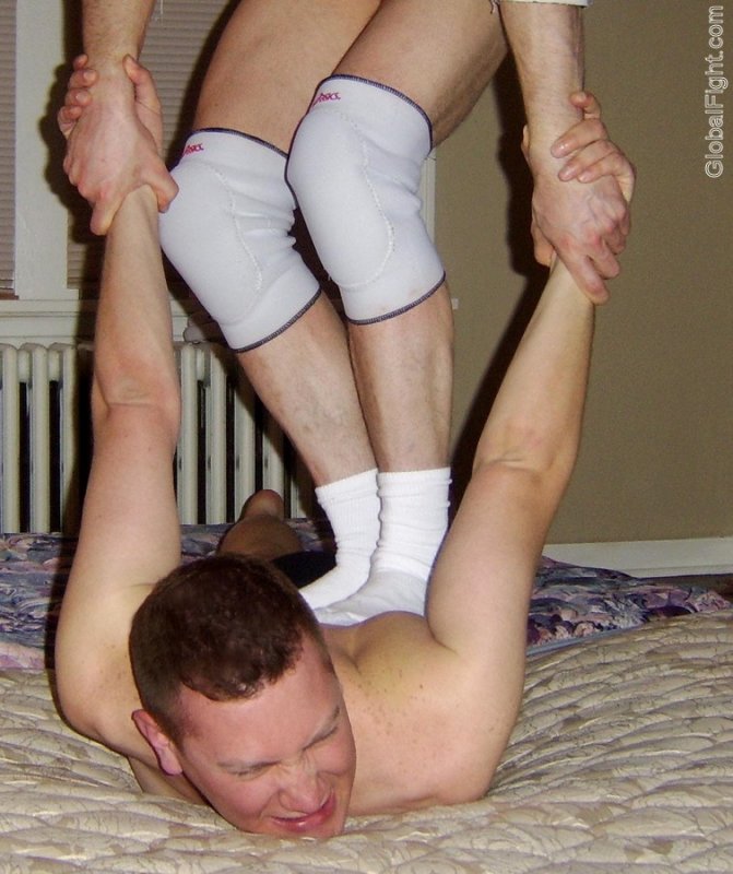 redheaded boy grappling bedroom wrestling arms bending.jpg