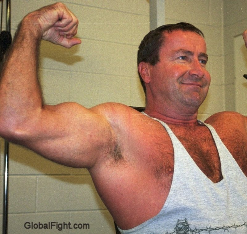 older hot handsome man flexing muscles hairy pits.jpg