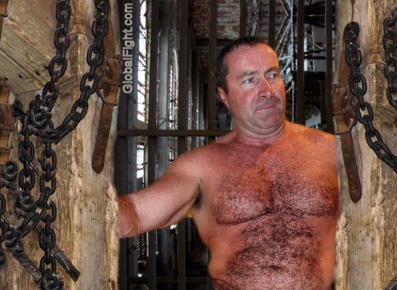 caged tiedup chained man gay pictures hunky men.jpg