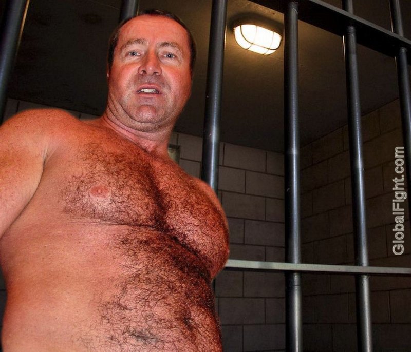 smiling prisoners shirtless bare hairychest guys.jpg