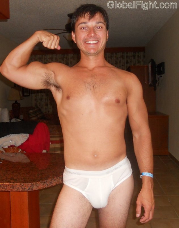 underwear bodybuilder wearing jockstrap flexing muscles.jpg