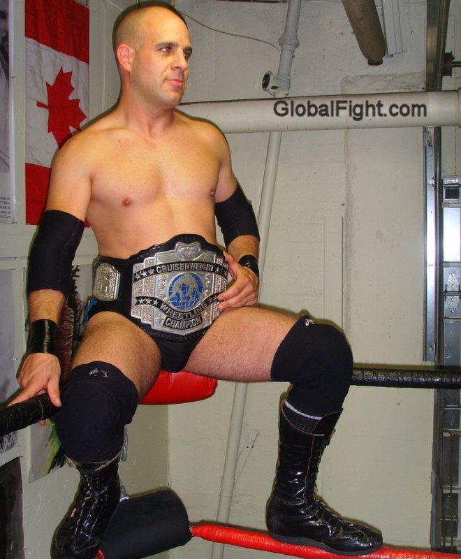 pro wrestling championship belt man posing shirtless.jpg