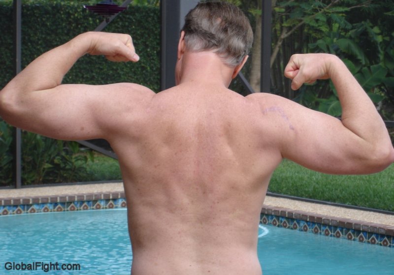 daddies flexing poolside showing off muscles daddy bear hunk.jpg