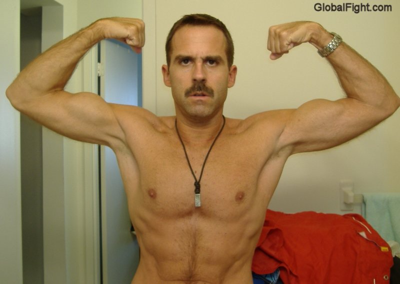italian double biceps flexing new york NYC gay man.jpg