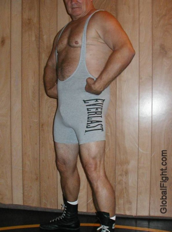 strong mature man wrestling singlet huge chest bulge arms.jpg