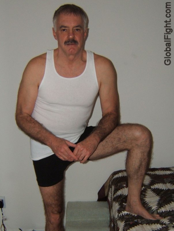 moustached daddy man hairychest tanktop.jpg