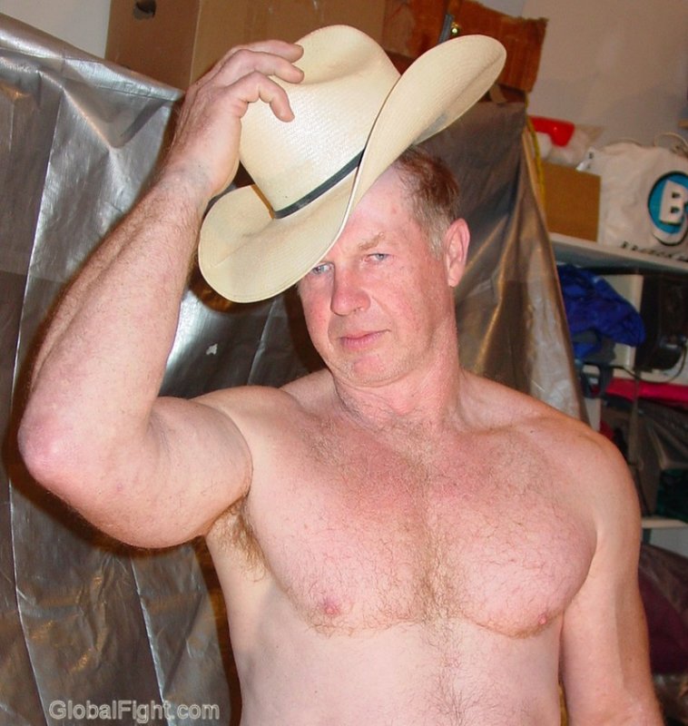 cowboy removing hat no shirt hot guy.jpeg