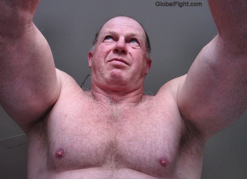 grandaddy flexing his big biceps hot grandpa.jpeg