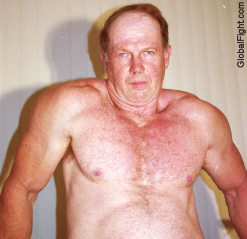 a redhead musclehunk older man big arms.jpg