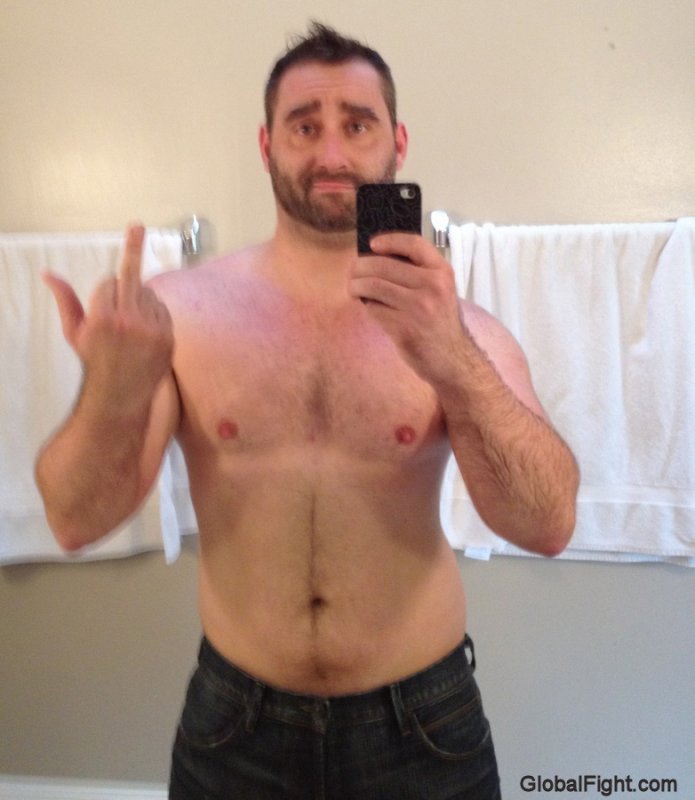 bad assed bearded cub jock wrestler shooting finger.jpg