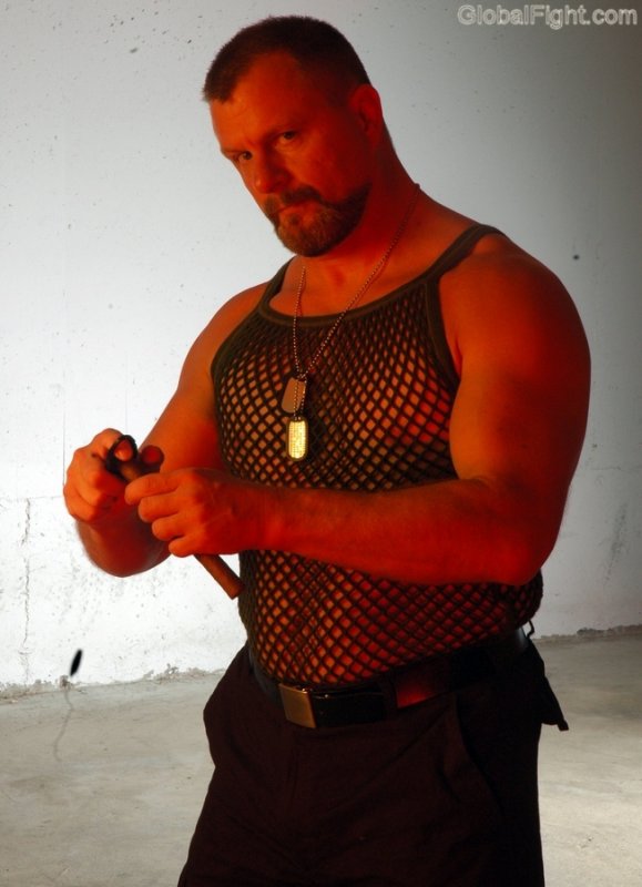 military tanktop muscleman smoking cigar stogie.jpg