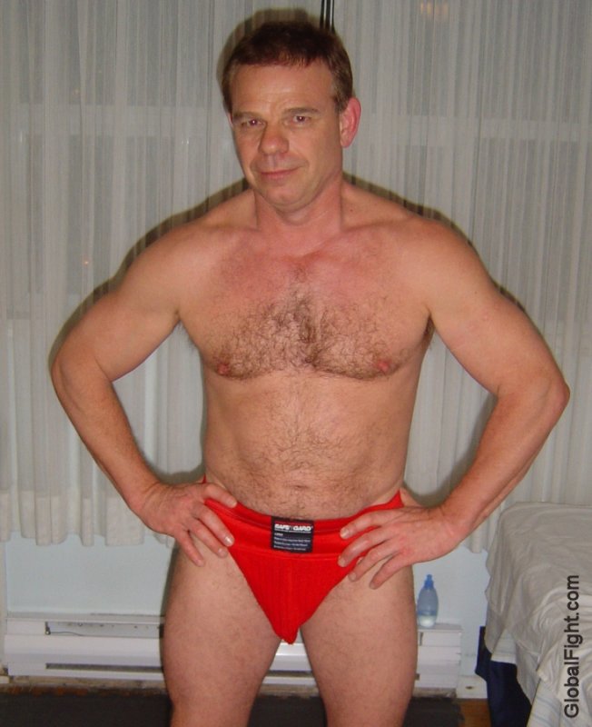 a man wearing red jockstrap hotel room photos.jpg