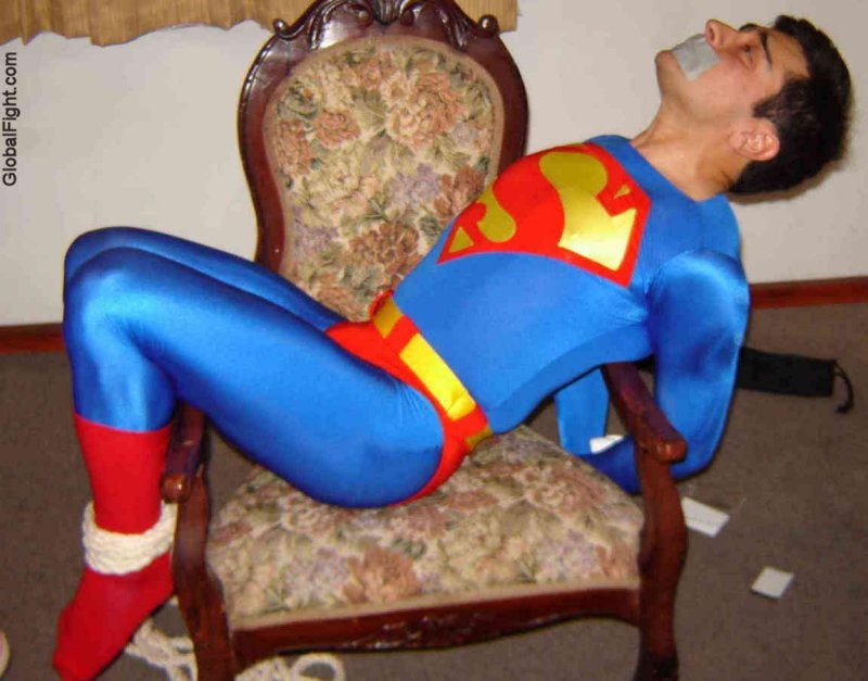 a superman bondage gay tortured superheros.jpg