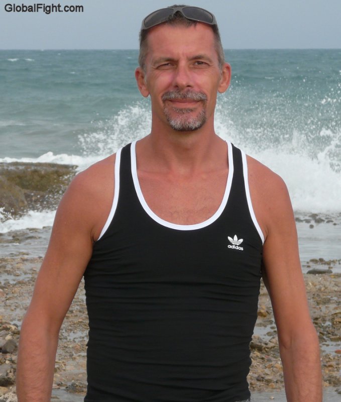 goatee man wearing tanktop ocean beachfront.jpg