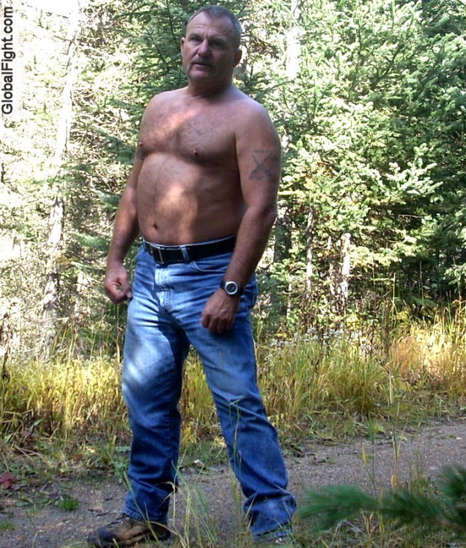 daddy bear wearing bluejeans hiking gay campground woods.jpg