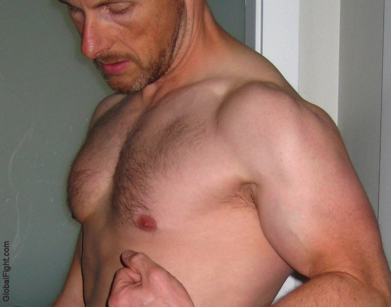 muscular jock posing shirtless locker room pix.jpg