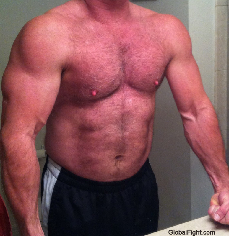 big muscular gay blong hairy muscular pecs chest stud.jpg