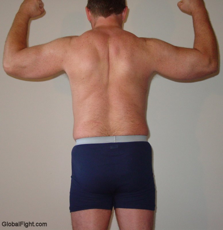 muscular hairy back muscles dads flexing showing off.jpg
