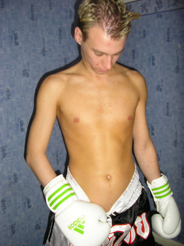 younger smooth shaved boxers posing pulling down trunks.jpg