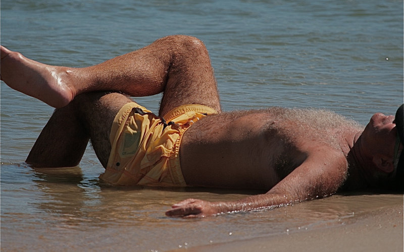 hairy legs ocean dad swimming sandy beach.jpg