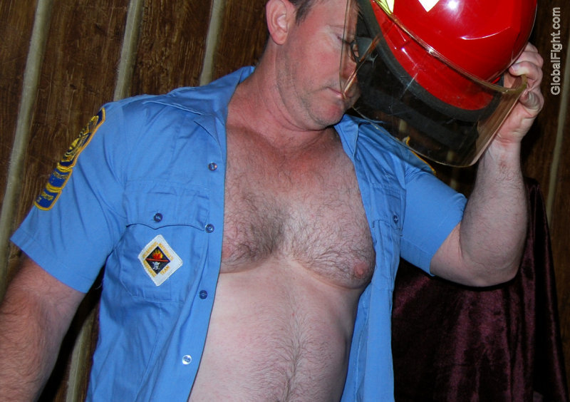 fireman undressing removing helmet shirt open.jpg