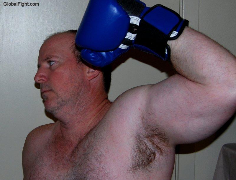 boxer raising arms hairy armpits.jpg