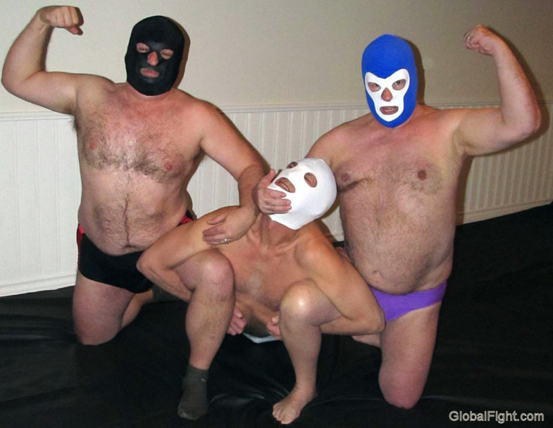 gay men grouped together wrestling roughhousing.jpg