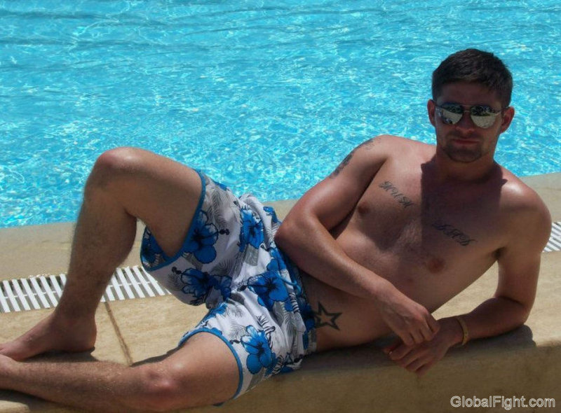 muscled jock dude poolside sunbathing.jpg