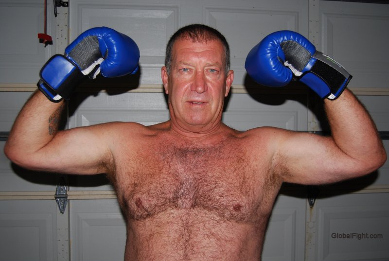 boxer olderman flexing hairy arms.JPG