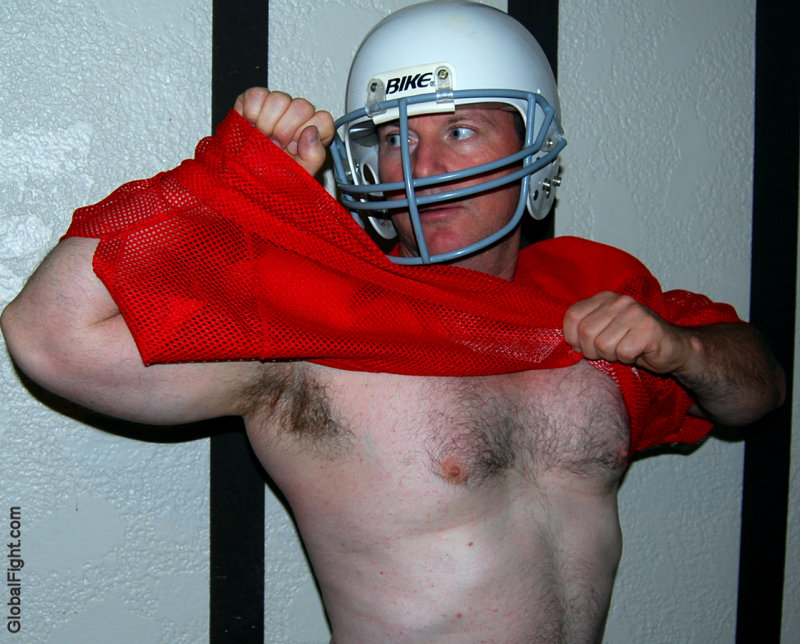 football player taking off jersey shirt.jpg