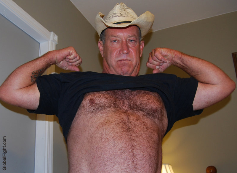 hairy cowboy daddy removing shirt.JPG