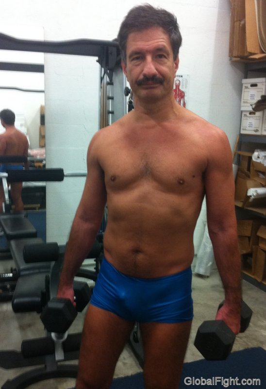 aerobic gay daddy working out gym weights.jpg