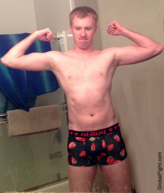 redhead dude wearing boxers bathroom flexing.jpg