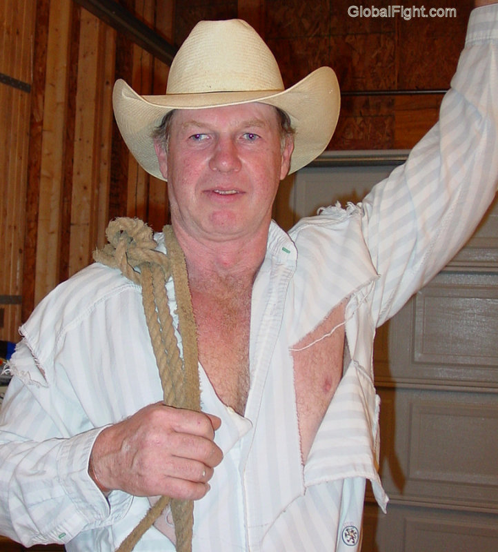 hot rodeo cowboy tornshirt ripped clothes.jpg