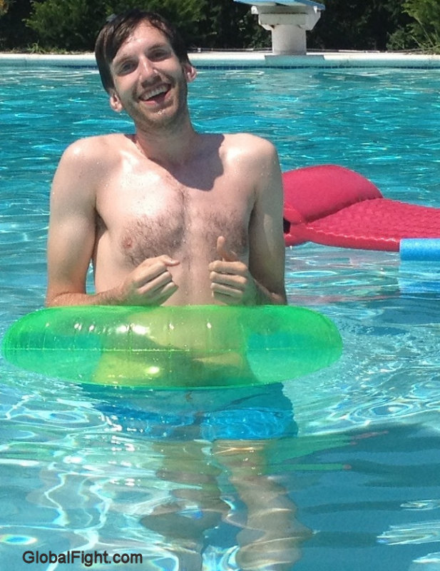 brother swimming rafting pool playing.jpg